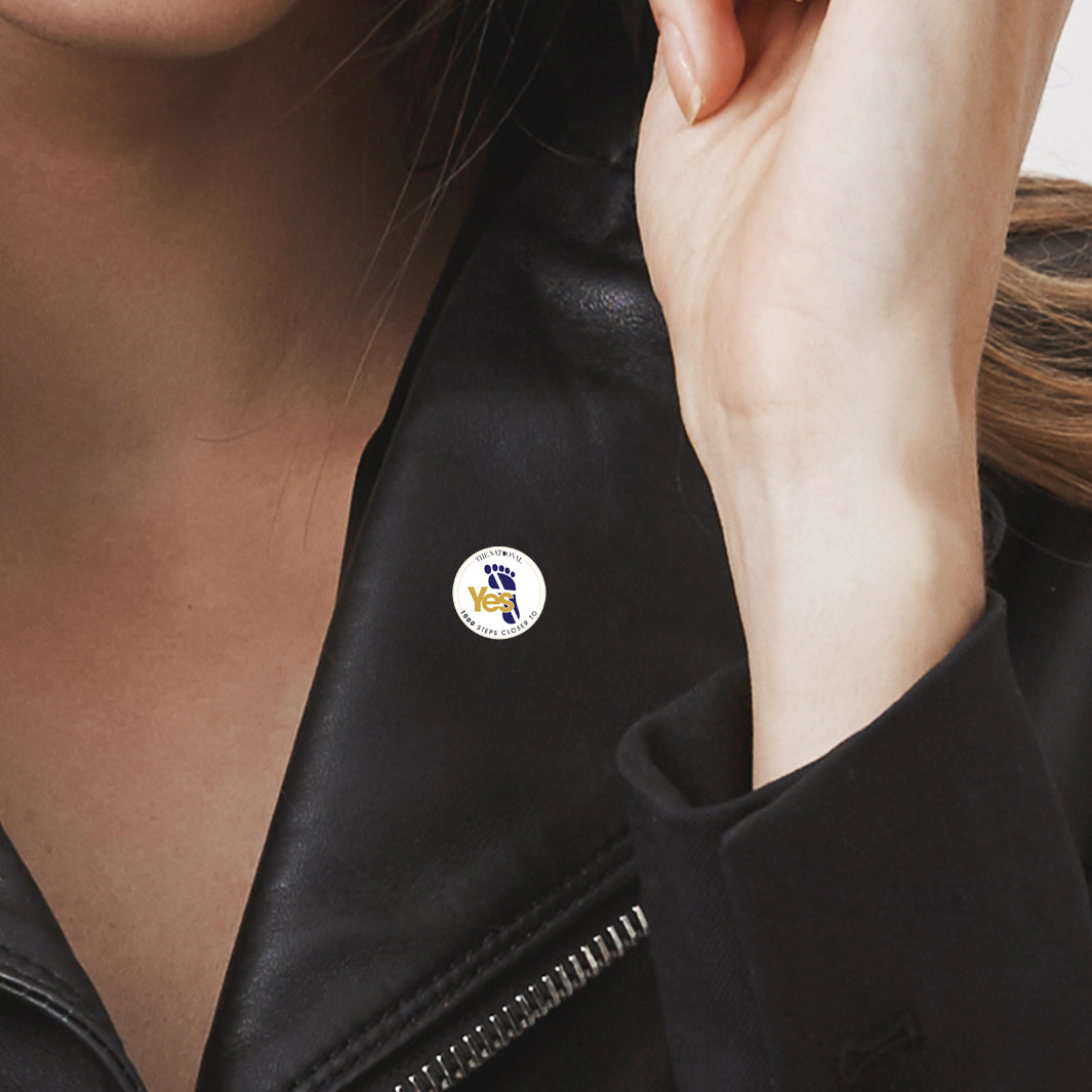 The National '1000th issue' badge